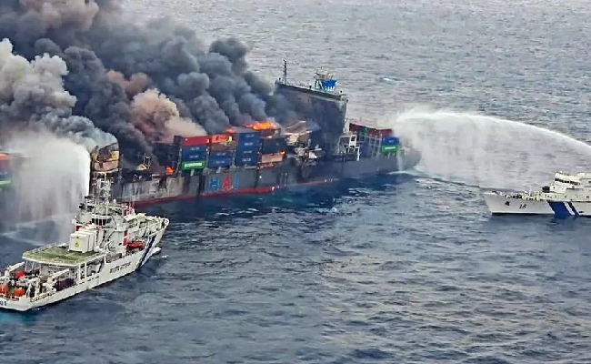 Singapore vessel on fire towed further out to sea as firefighting continues